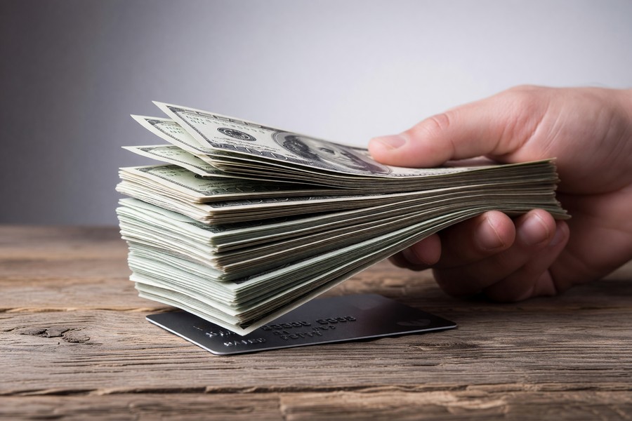 Infographic showing how credit card interest erodes rewards earnings at a 24% APR over six months