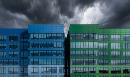 Corporate building split in two representing Sallie Mae and Navient company separation