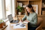Person working from home at a desk calculating home office tax deductions